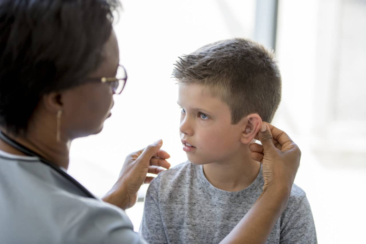 Child having their hearing aid fit